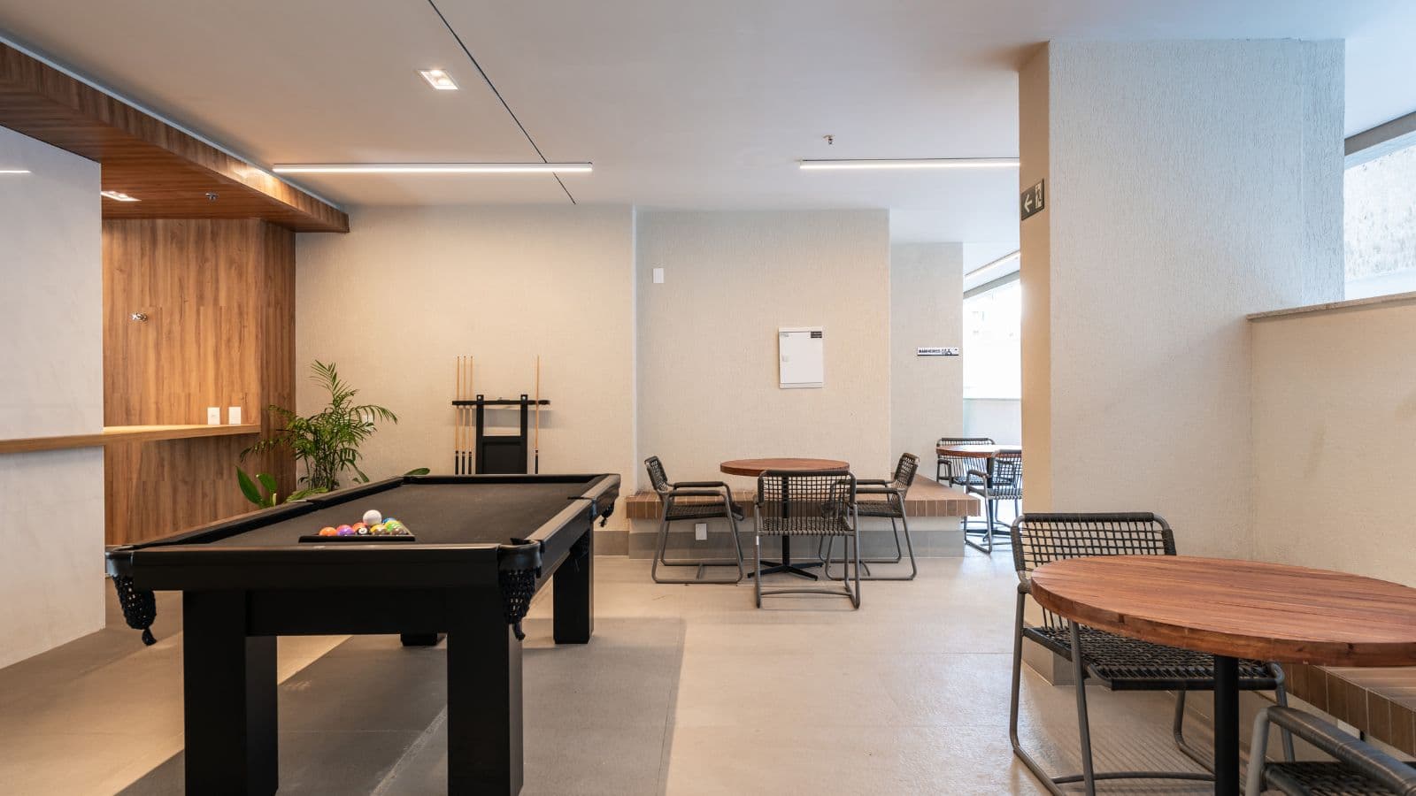Foto real da sala de jogos do Home Boutique by Tegra