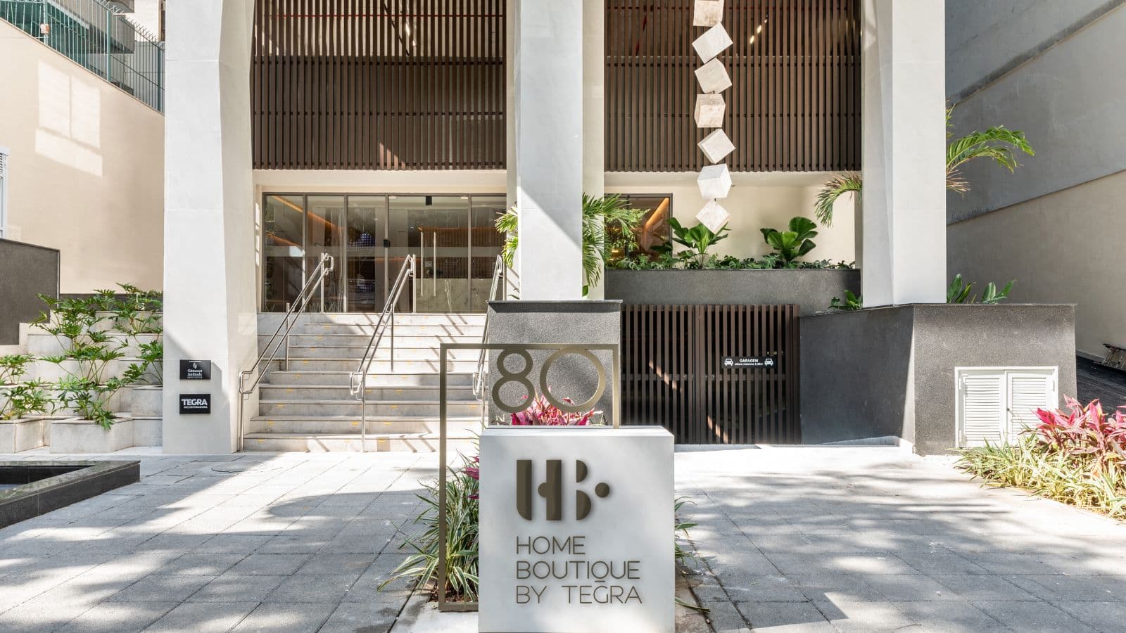 Foto real do acesso do Home Boutique by Tegra